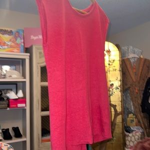 Brand new linen shirt button back with low open flare. Size small.